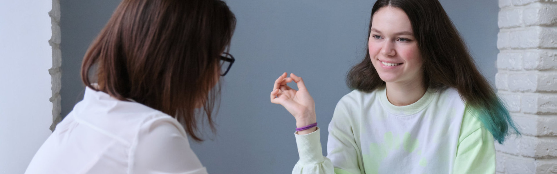 cheerful woman talking to therapist